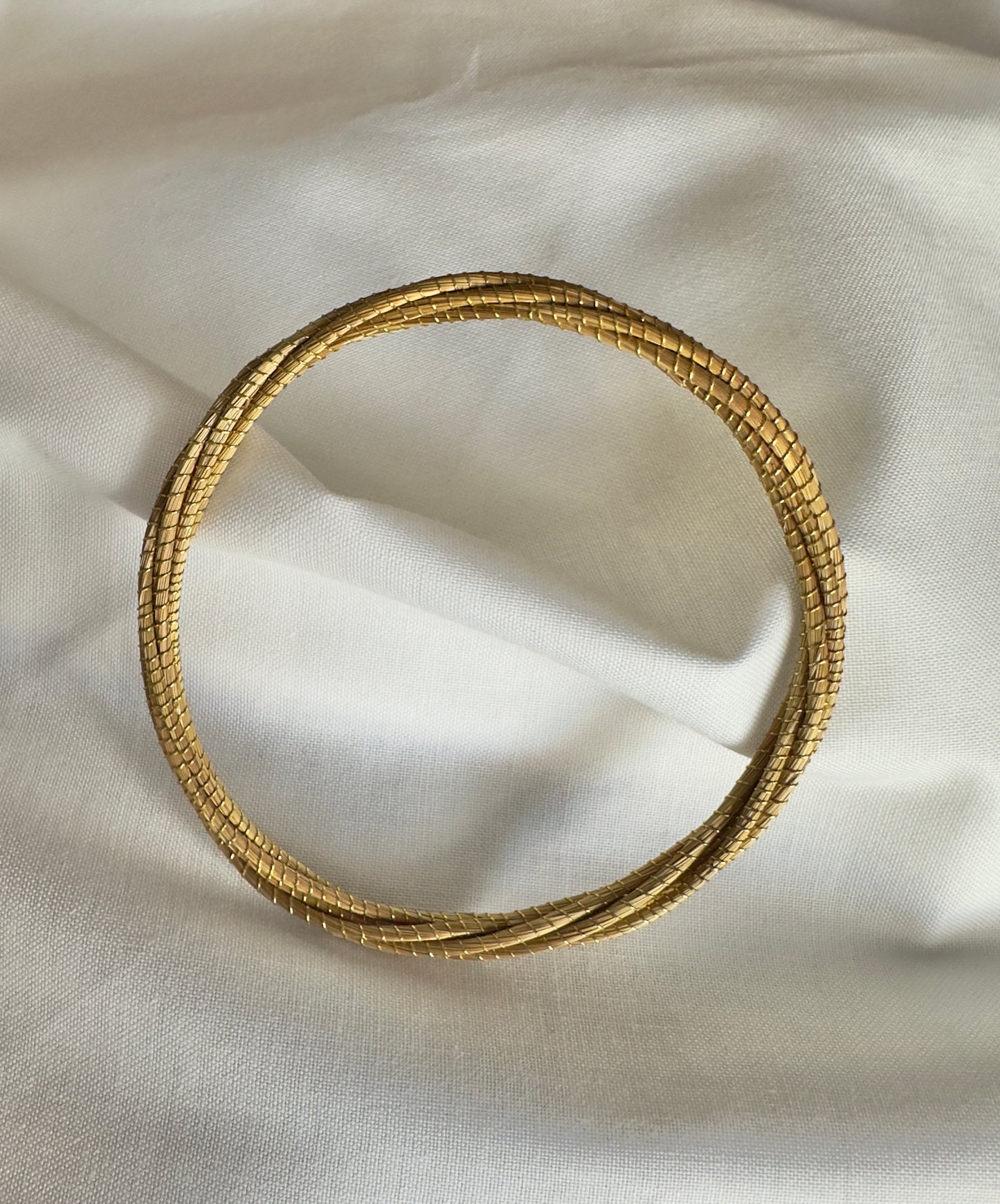 Vyna II Golden Grass Thin Twisted Bangle