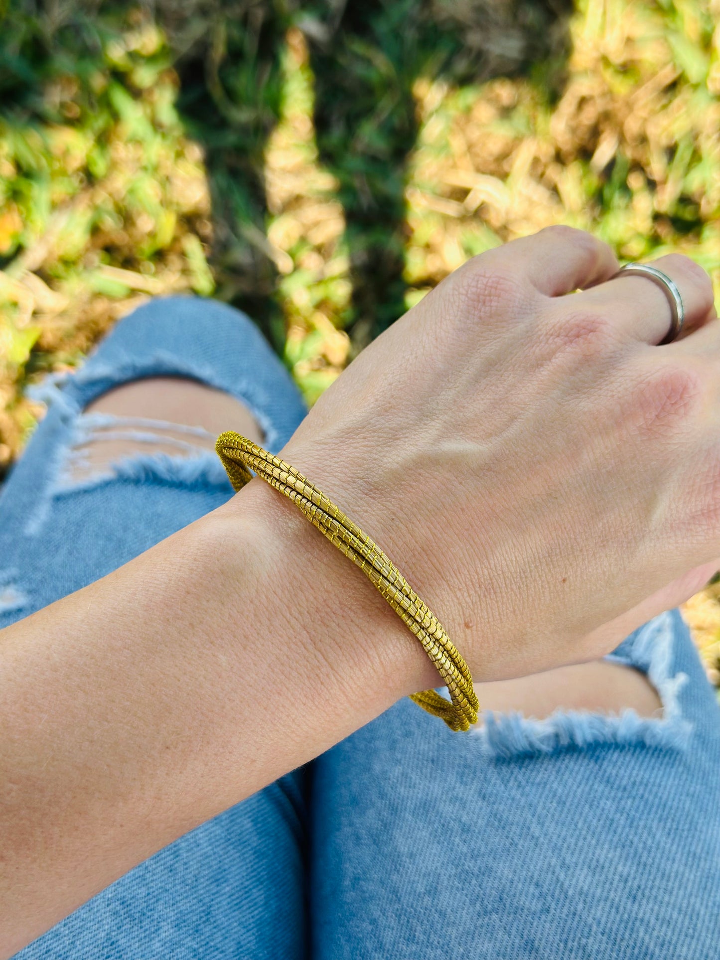 Vyna II Golden Grass Thin Twisted Bangle