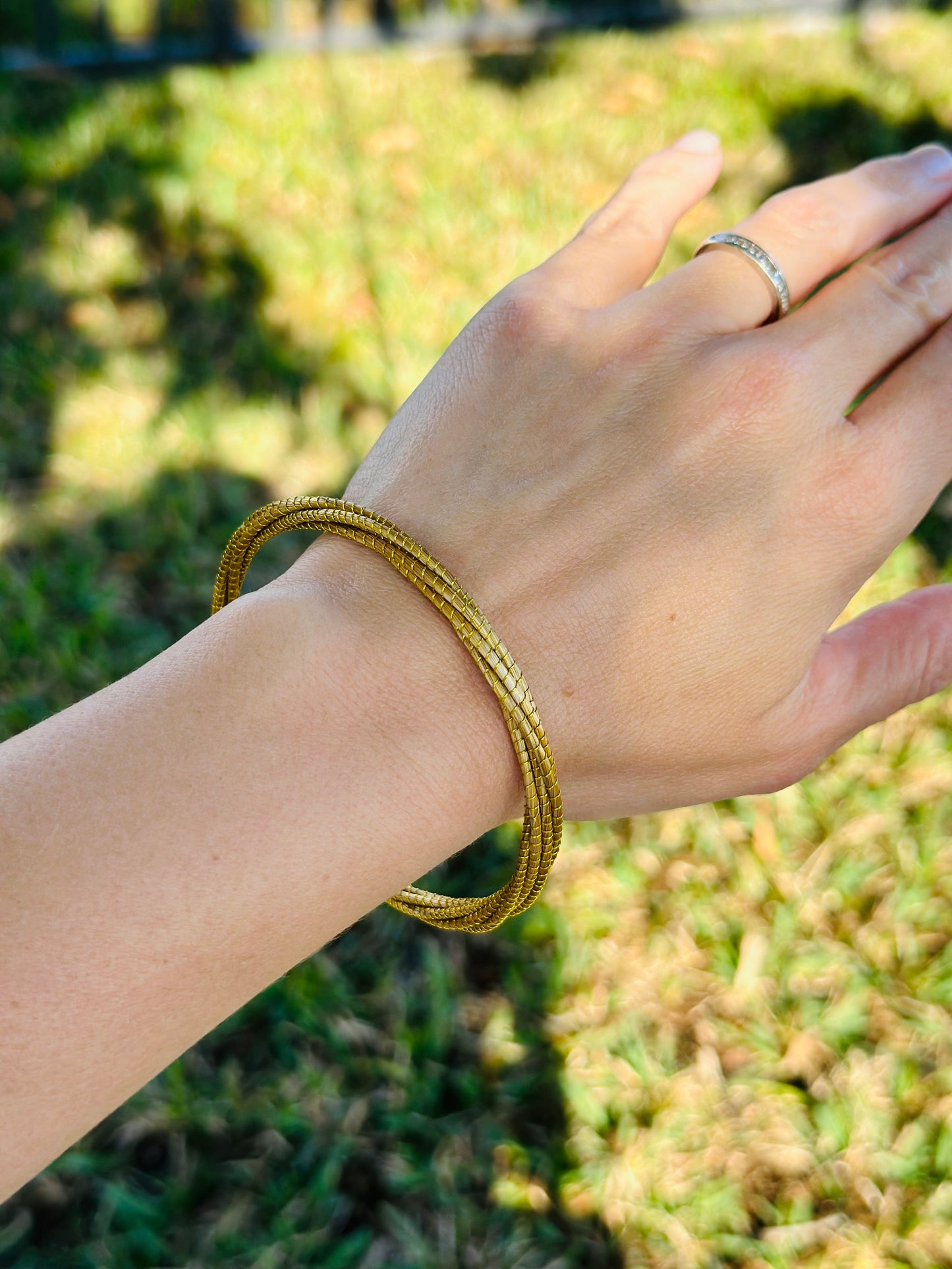 Vyna II Golden Grass Thin Twisted Bangle